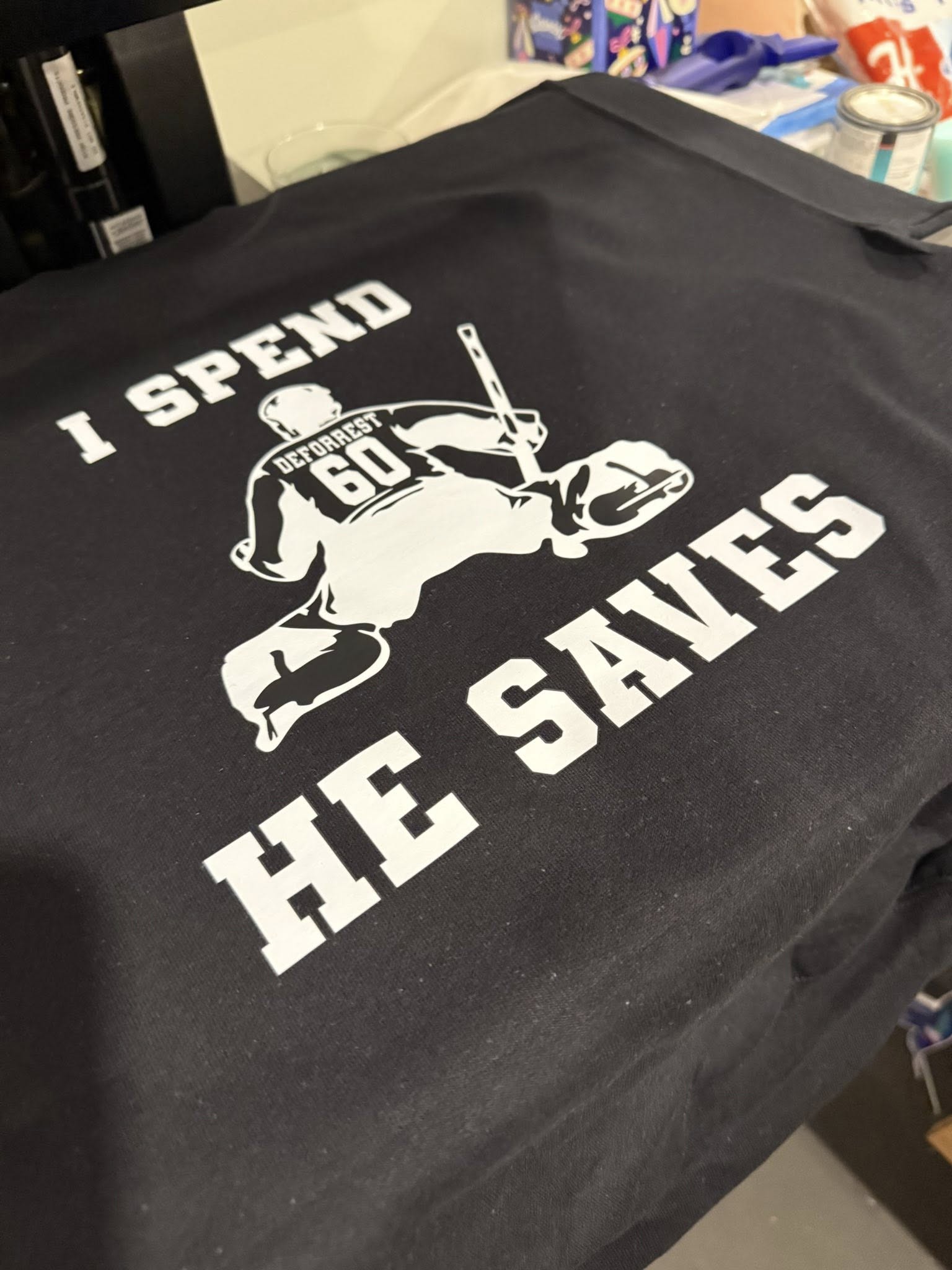 I Spend, He Saves T-Shirt